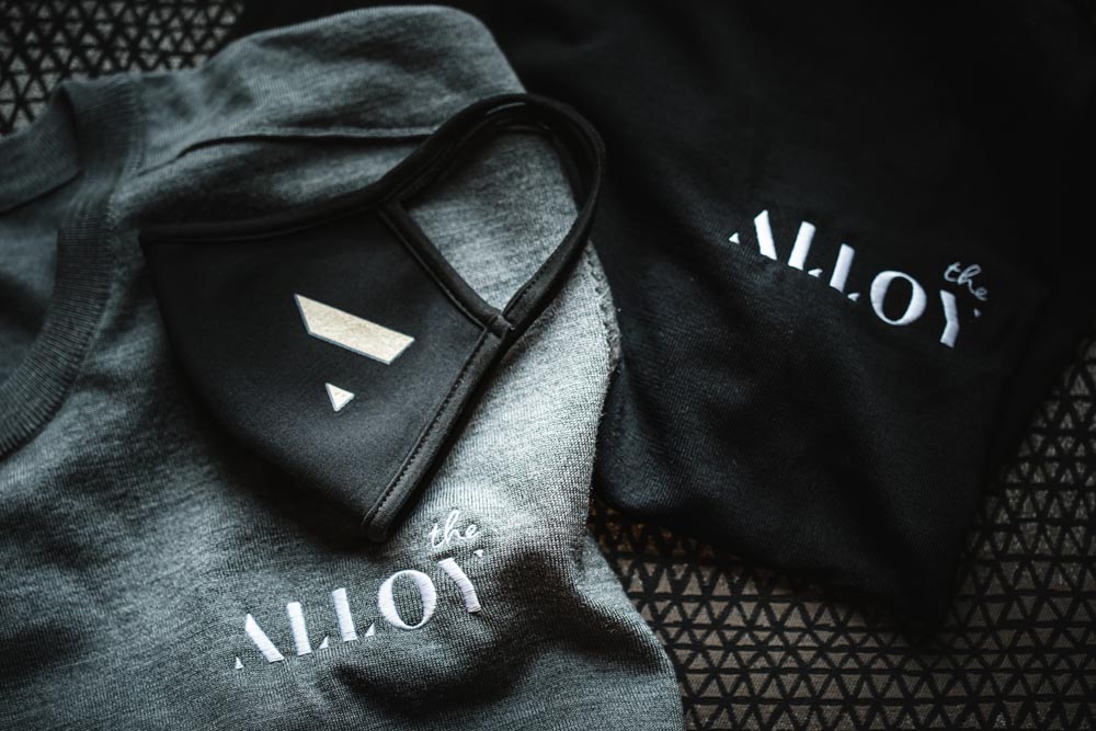 face mask featuring the alloy hotel branding