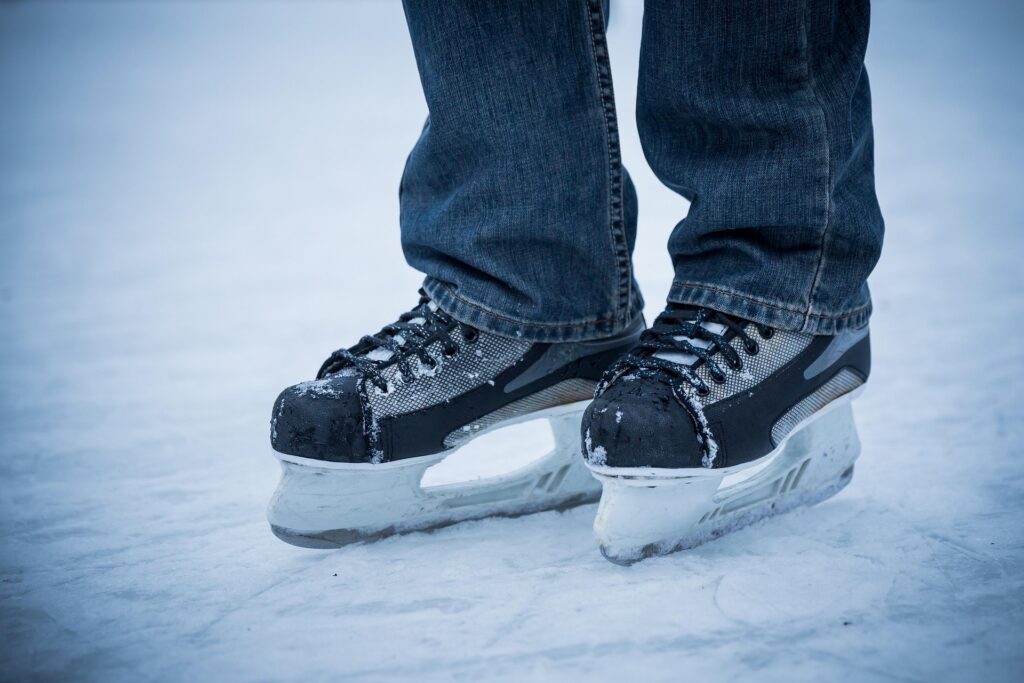 Close up of black ice skates